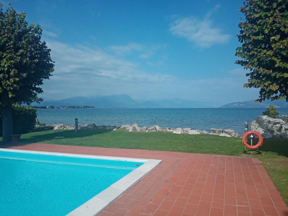 Casa Lugana 19 - Monolocale Con Piscina Direttamente A Lago Сирмионе Экстерьер фото